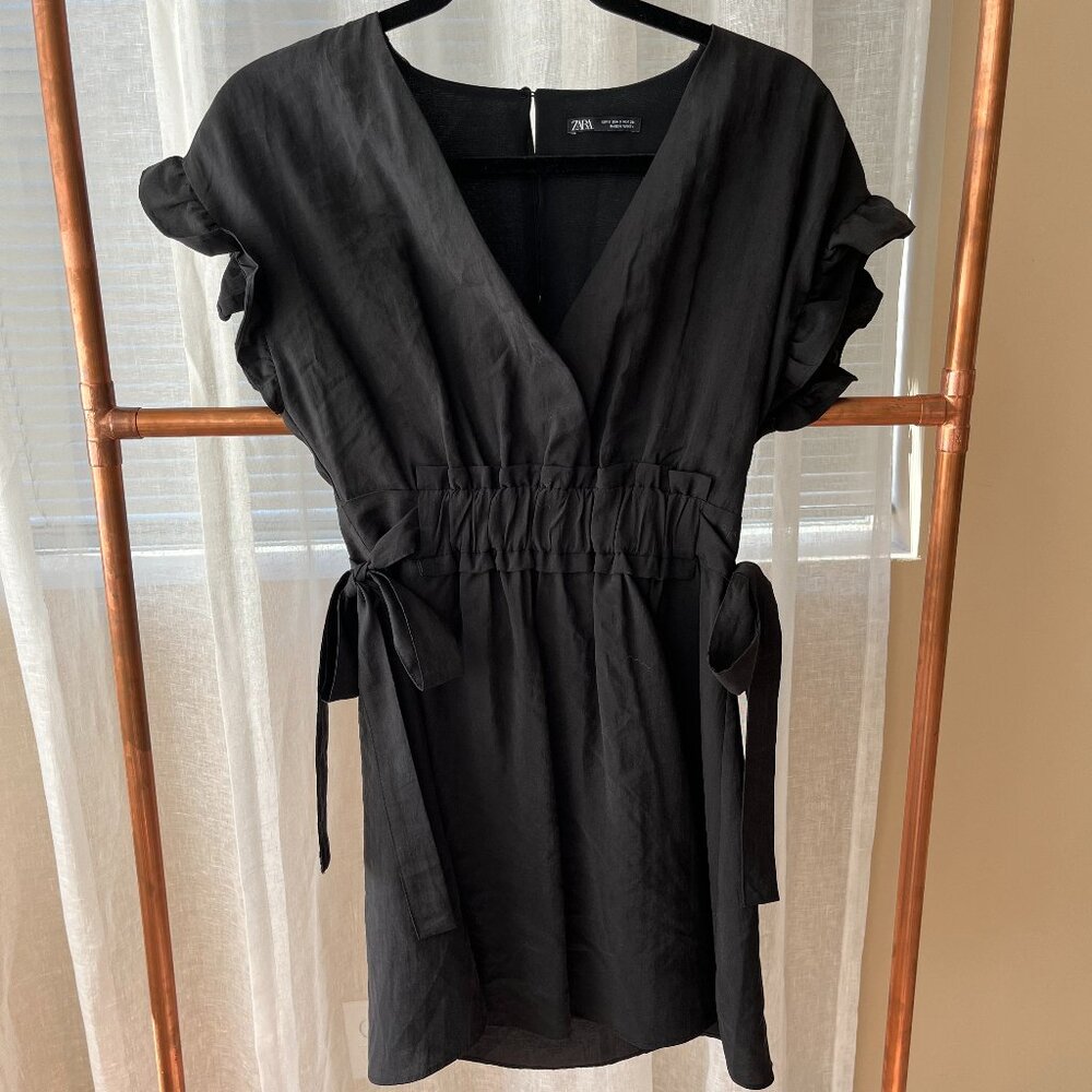 Zara black ruffle dress with waist ties. Size small. Excellent condition.